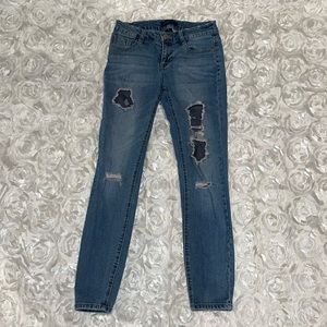 Ripped Jeans with Fishnet